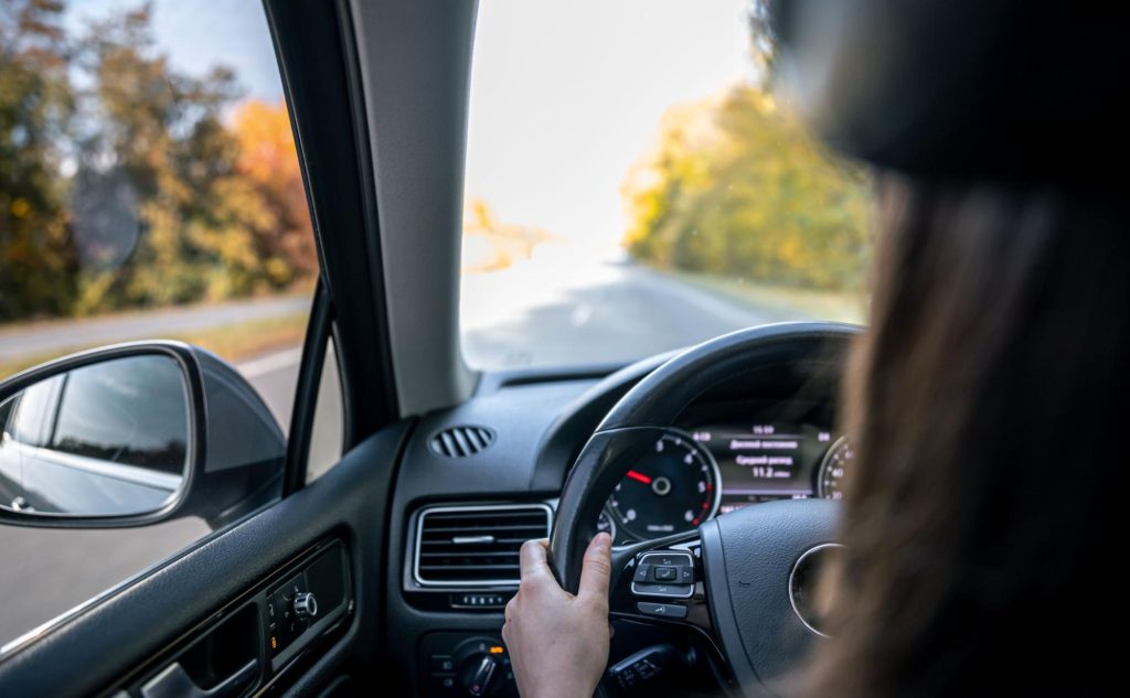woman driving with P0455 EVAP code